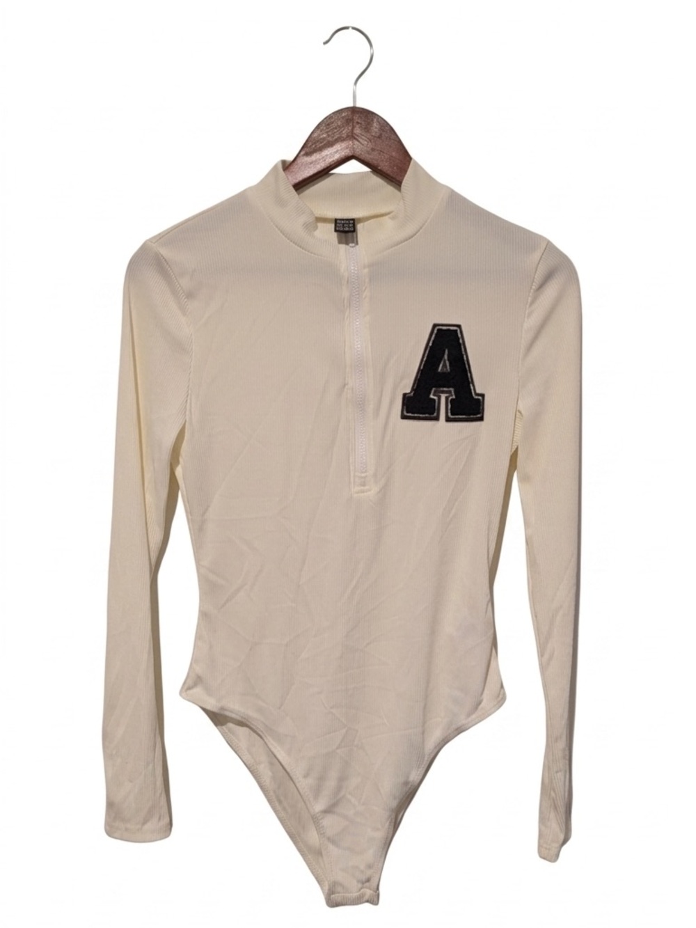 SHEIN Cream Long Sleeve Mock Neck Bodysuit with Black 'A' Patch